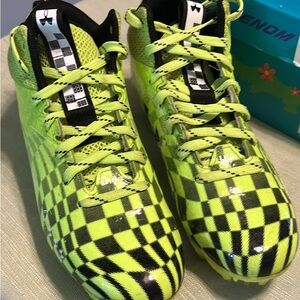 Under Armour Green and Black Checkered Youth Football Cleats